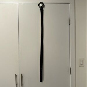 Fancy black leather belt.